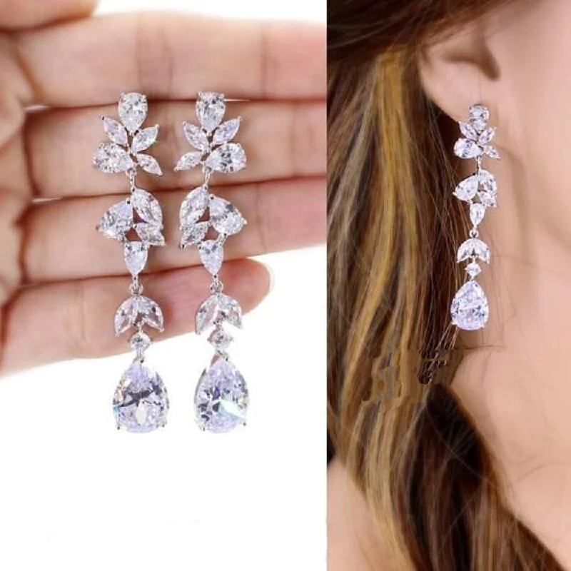 luxury gold earrings for women-Manisha Jewellery Silver Plated Crystal Stone Dangler Earrings