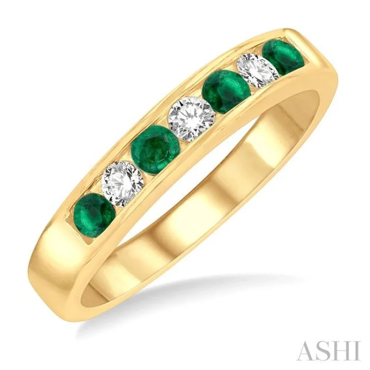 custom name rings for women-1/5 Ctw Channel Set Round Cut Diamond and 2.5 MM Round Cut Emerald Band in 14K Yellow Gold